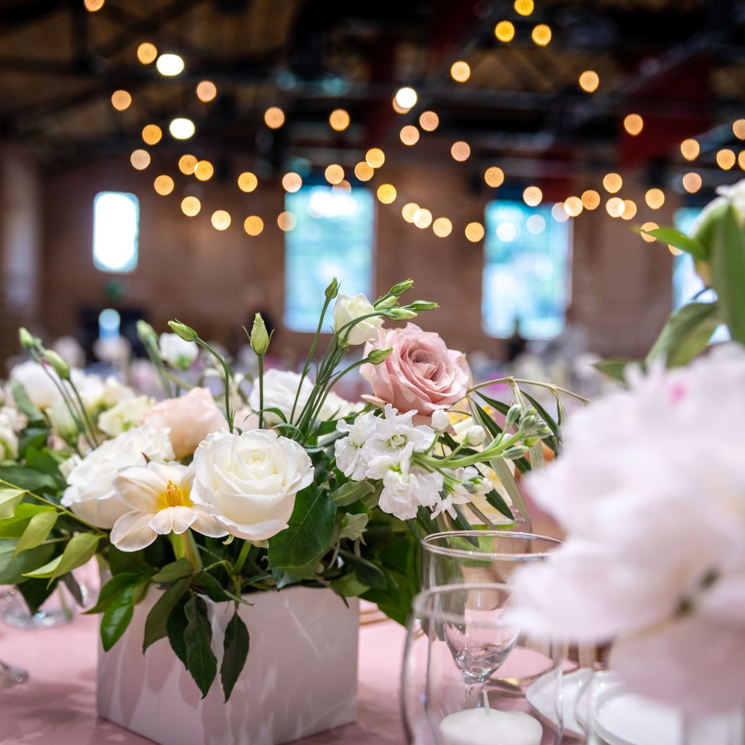 A flower arrangement in a wedding venue