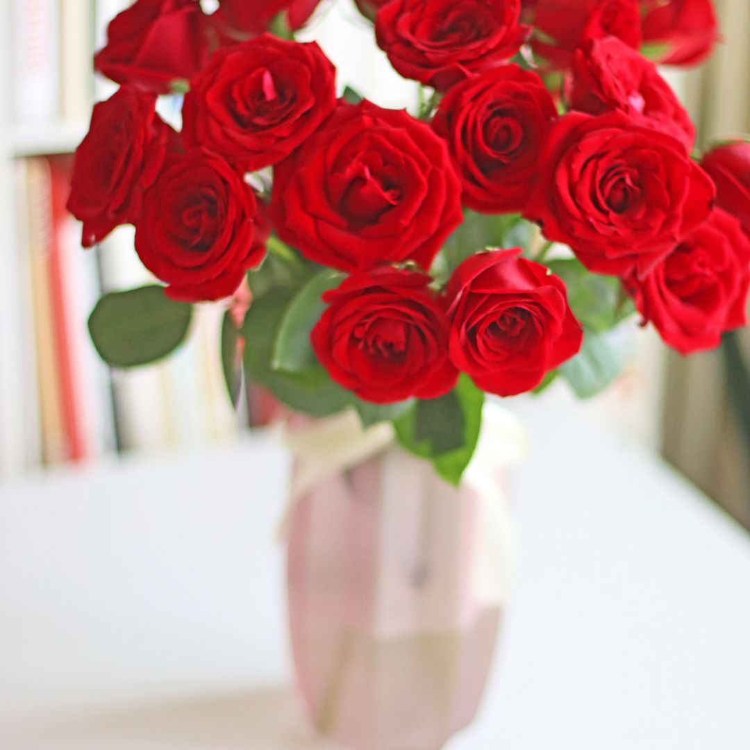 An arrangement of red roses